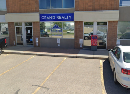 荣信地产 (Grand Realty & Management Ltd.)